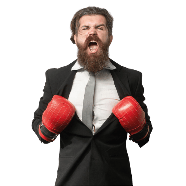 Homme en costume avec des gants de boxe